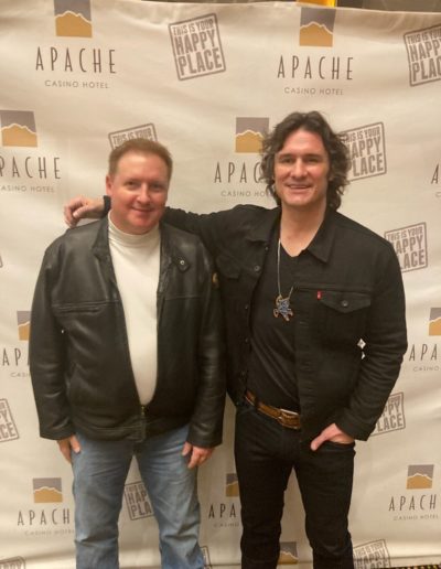 Songwriter Kevin Stroud with country music performer Joe Nichols in front of a white background